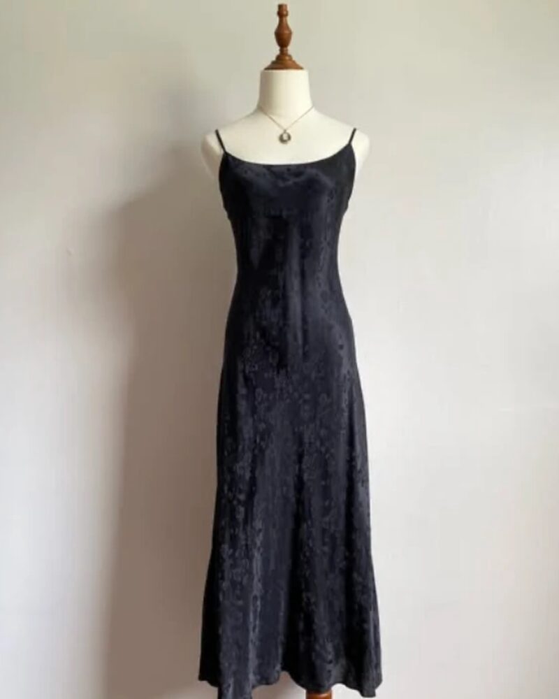 Black silk jacquard slip dress, on a dress form